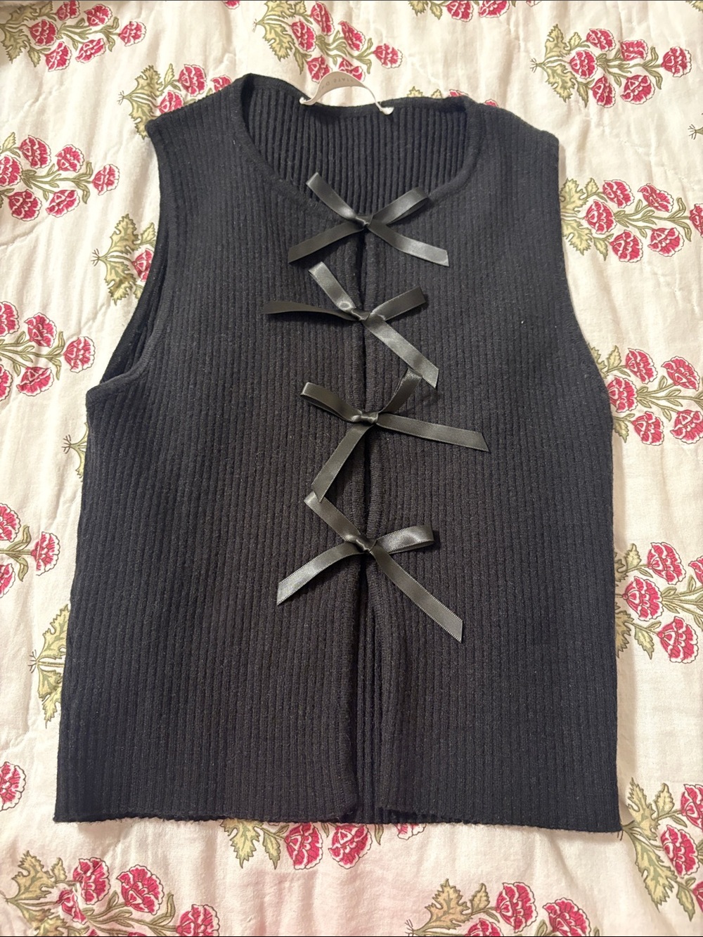 Black Sleeveless Knit Top with Bow Tie Front